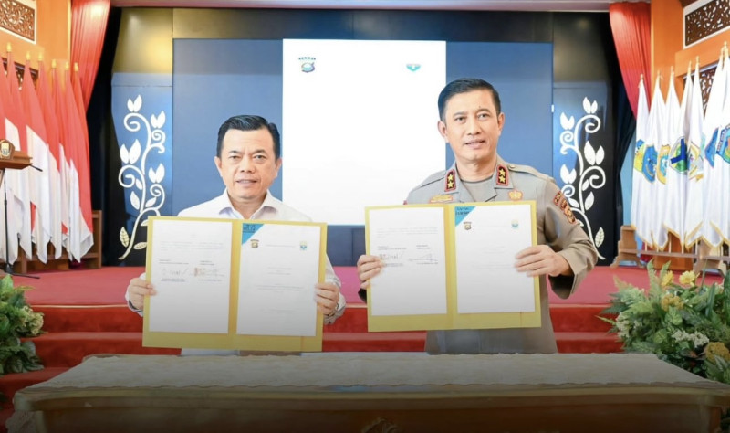Gubernur Al Haris dan Kapolda Jambi  Tandatangani NPHD Dana Pengamanan Pilkada 2024